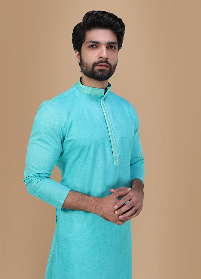 alt message - Manyavar Men Seafoam Green Solid Kurta Set With Neck Detailing image number 0